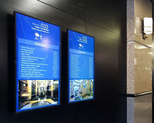 Digital building directory screens in a foyer